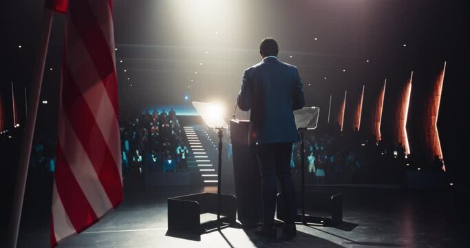Politician Delivering a Speech at a Campaign Rally. Political Party Member Giving a Passionate Presentation to Excited Voters, Promising Wealth and Prosperity to United States of America