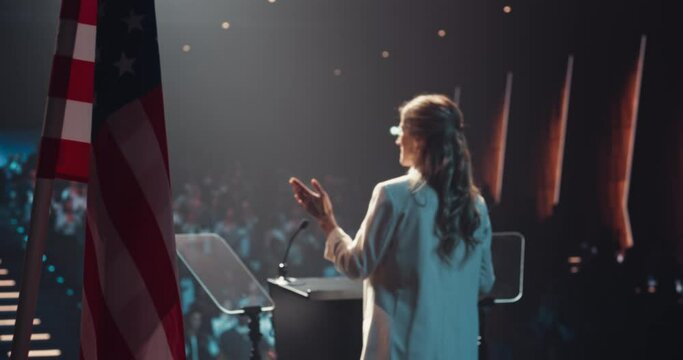 Female Politician Delivering a Speech at a Campaign Rally. Political Party Member Giving a Passionate Presentation to Excited Voters, Promising Wealth and Prosperity to United States of America