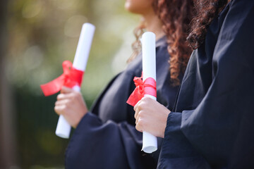 University, hands and women with diploma at graduation, ceremony or outdoor campus event together....