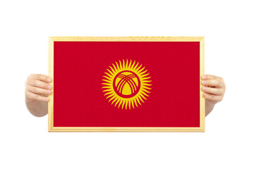 Hands holding a white frame with Kyrgyzstan flag, two hands and frame, celebration or campaigning 