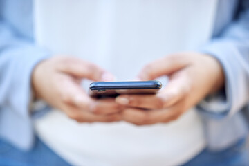 Outdoor, smartphone and hands on closeup for typing, chatting and networking on social media. Business person, digital communication and scroll with mobile, technology and text message with internet