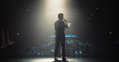 Indian Startup Founder Speaking at a Global Economic Strategies at International Business Conference. Public Speaker Sharing Professional Knowledge and Leadership Insights. Footage from Behind