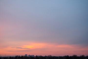 Fototapeta na wymiar Morning sky and urban silhouette