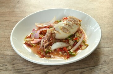 squid stuffed mashed pork Thai salad taste spicy and sour on plate
