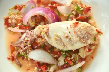 squid stuffed mashed pork Thai salad taste spicy and sour on plate