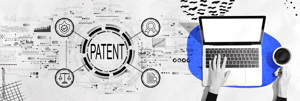 Wall mural patent concept with person using a laptop computer