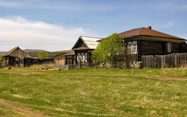 Obraz premium The old village of Aleksandrovka on the Yuryuzan River, Katav-Ivanovo district, Chelyabinsk region, eco-village