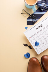 A creative flat lay featuring Father's Day gifts with a calendar, coffee mug, and accessories on a beige background, ideal for gift guides and promotional content