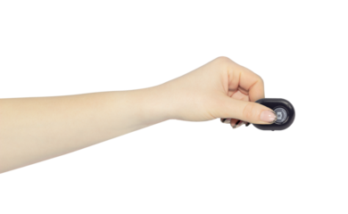 wireless remote for camera, bluetooth remote for phone camera in hand, outstretched hand with remote isolated from background