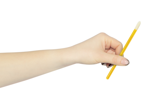 velor eyelash applicator in hand, outstretched hand with velor eyelash applicator isolated from background