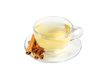 Fragrant hot tea with cinnamon stick and anise isolated on white background. A cup of hot tea with honey, lemon, mint and apples. Spicy tea with spices. Immunity tea. Health concept.