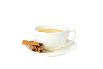 Fragrant hot tea with cinnamon stick and anise isolated on white background. A cup of hot tea with honey, lemon, mint and apples. Spicy tea with spices. Immunity tea. Health concept.