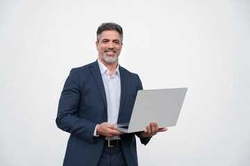 Portrait of middle age mature businessman using pc laptop for business work. Smiling handsome older man in formal suit holding desktop computer, looking at camera. Isolated white background copy space