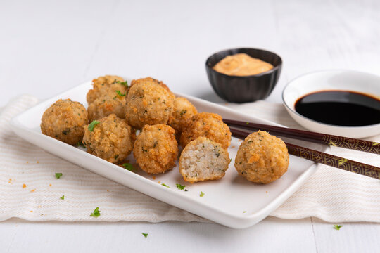 Vegan sticky rice balls with Sriracha 'mayo' and soy sauce