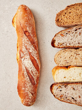 Baguette and various types of bread slices