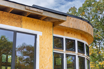 During construction of house, the joist framework has been installed, along with gutter holders...