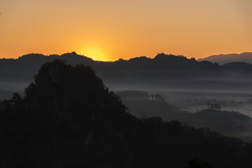 Mountain valley during sunrise. Natural summer landscape