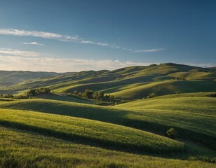 Indulge in the beauty of a countryside landscape with rolling hills and a clear blue sky.