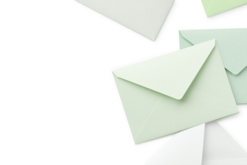 Pale green and white cutout envelopes are placed randomly, with copy space to the left.	