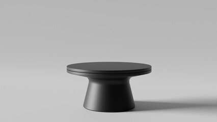 a black stool with a black top on a gray surface