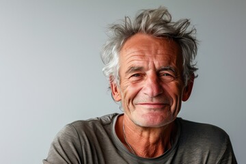 Fototapeta premium Joyful Mature Gentleman in Studio Lighting