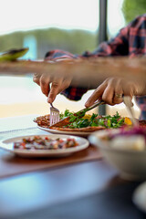 A tantalizing plate of Meat Kebab, French fries, kebabs, and fresh vegetables awaits a hungry diner. The fries are golden brown and crispy, the kebabs are tender and flavorful, and the vegetables