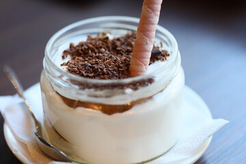 A delicious dessert in a jar with a carrot. Perfect for food and recipe websites