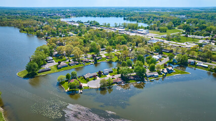 Aerial View of Serene Suburban Riverfront Homes in Warsaw, Indiana