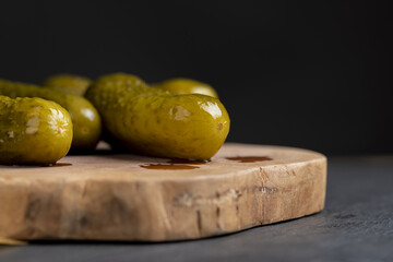 green cucumbers pickled in vinegar