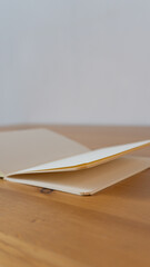Open Notebook on Wooden Table