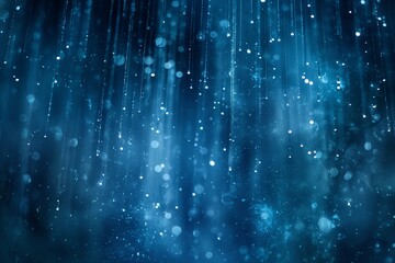 Blue glitter particles float in front of a dark blue background.