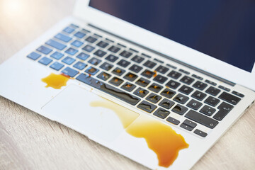 Accident, coffee spill or mistake and laptop with damage on desk or table in office from above....