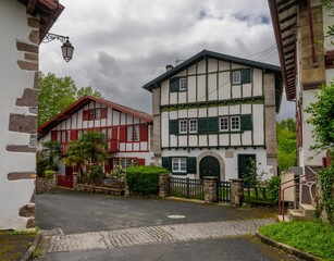 typical colourful Basque houses in the mountain village of Ainhoa in the Pyrenees