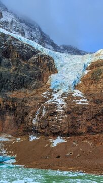 On the north face of Jasper's majestic Mount Edith Cavell flows the Angel Glacier. Vertical video.