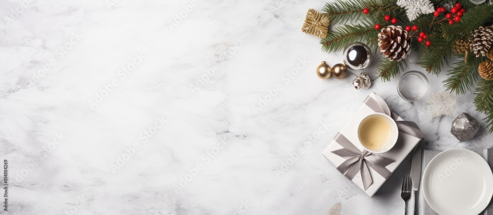 Poster a festive christmas table is adorned with silverware a present box and xmas decorations all arranged