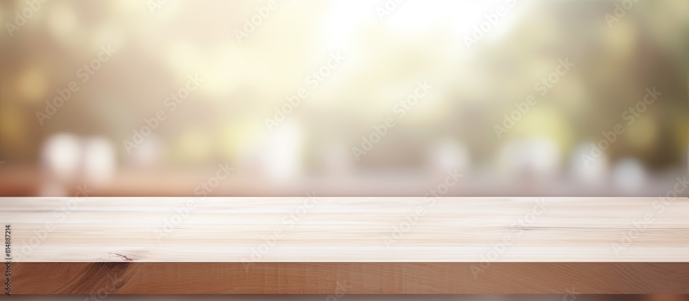 Poster design ready copy space image with a blurred bokeh background showcases an empty white wooden surfac