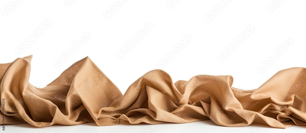 Aufkleber an image showing crumpled brown baking paper sheets on a white background with copy space