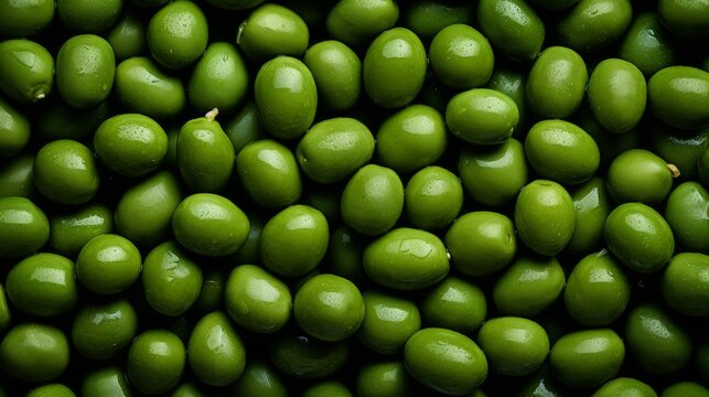 Vibrant full frame banner featuring a background of fresh green olives for engaging presentations