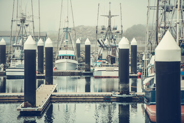 Fishing Boats in Crescent City Harbor on Foggy Day. California USA