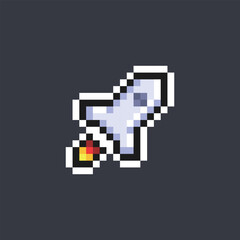 flying rocket in pixel art style