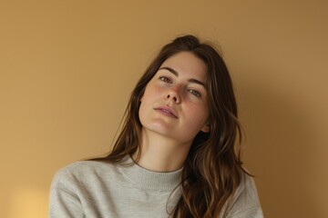 Fototapeta premium Woman in Beige Sweater, Beige Background. Generative AI.