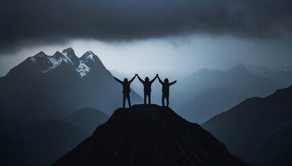 Three person stand on the top of a mountain holding their hands up in the air - Powered by Adobe