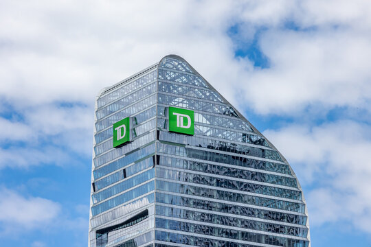 Toronto, Canada,  May 10, 2024; The green TD sign at the glass atrium of the new Toronto Dominion Bank building in on Front and Simcoe Street in Downtown Toronto