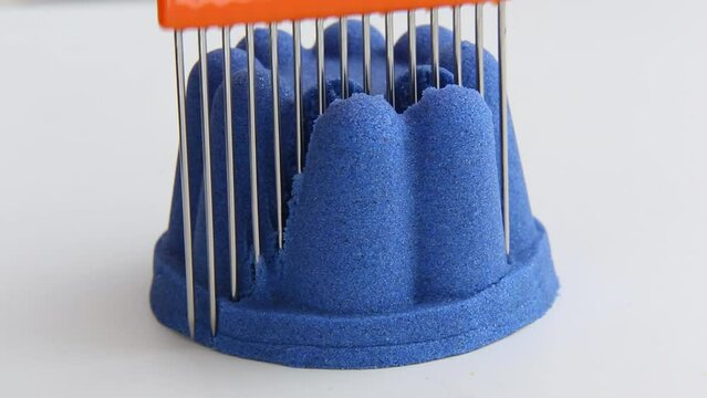 Kinetic sand is all blue in color. Cutting kinetic sand ASMR relaxing video. ASMR video