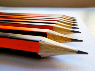 Black and orange pencils