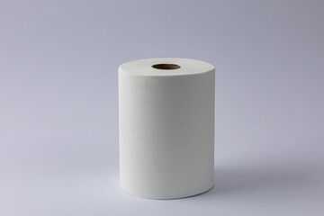 Toilet paper roll on grey white background.