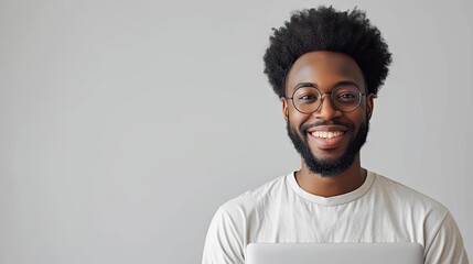 Obraz premium Employee smiling while holding a laptop, benefit of remote work options, technologyenabled flexibility, isolated on white