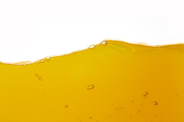 Yellow oil texture isolated white background,Vegetable oil background