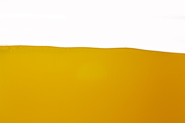 Yellow oil texture isolated white background,Vegetable oil background