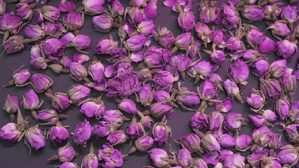 Dried rose buds flowers background